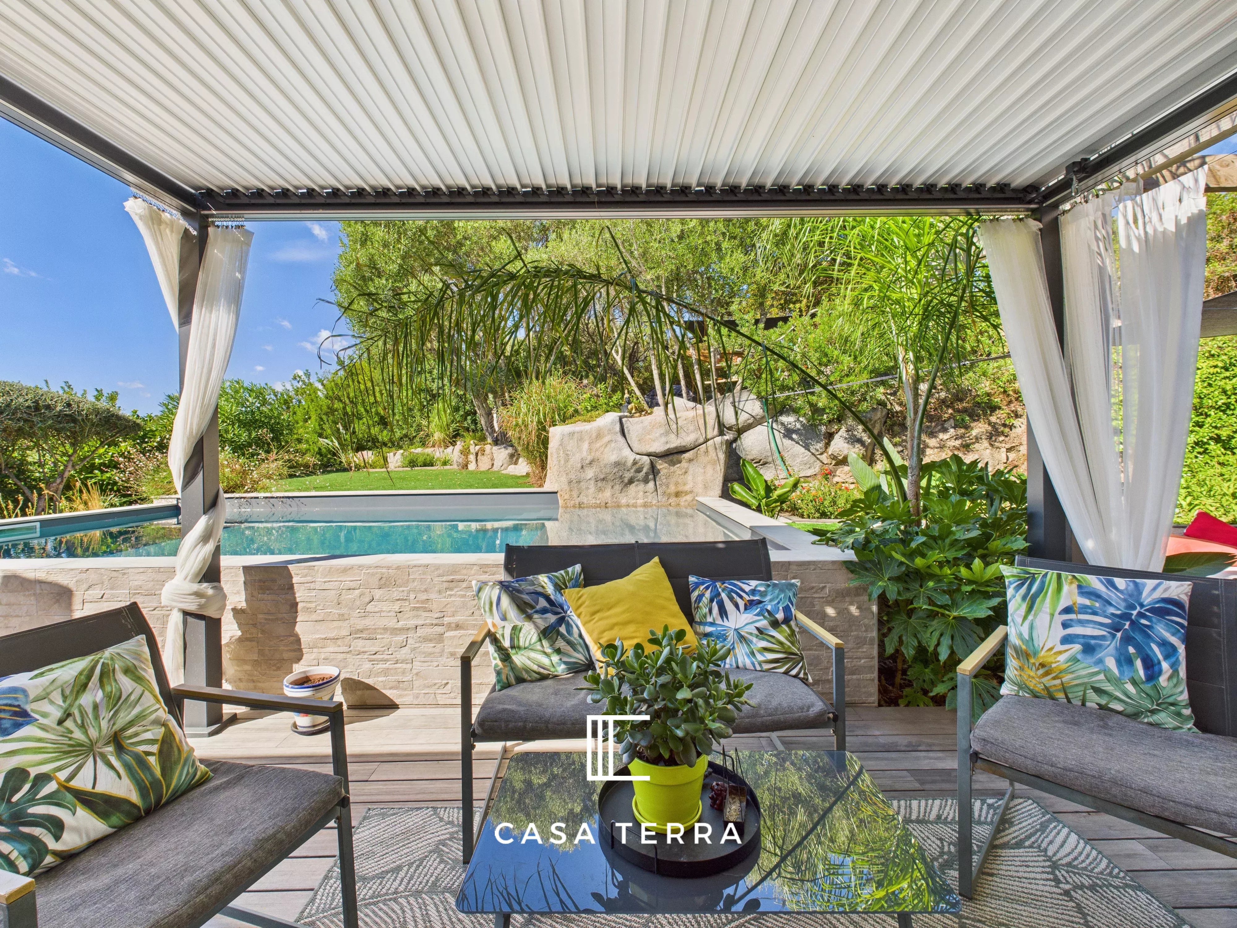 Photo 2 — Casa Terra Real Estate