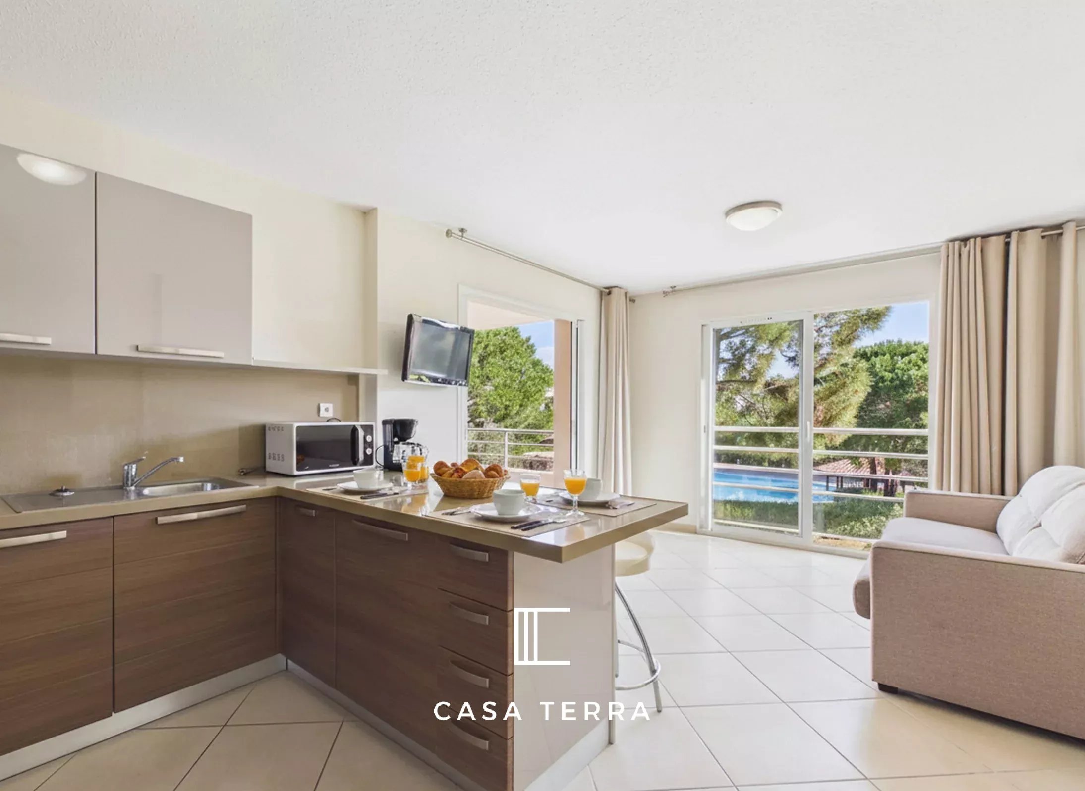 Photo 2 — Casa Terra Real Estate