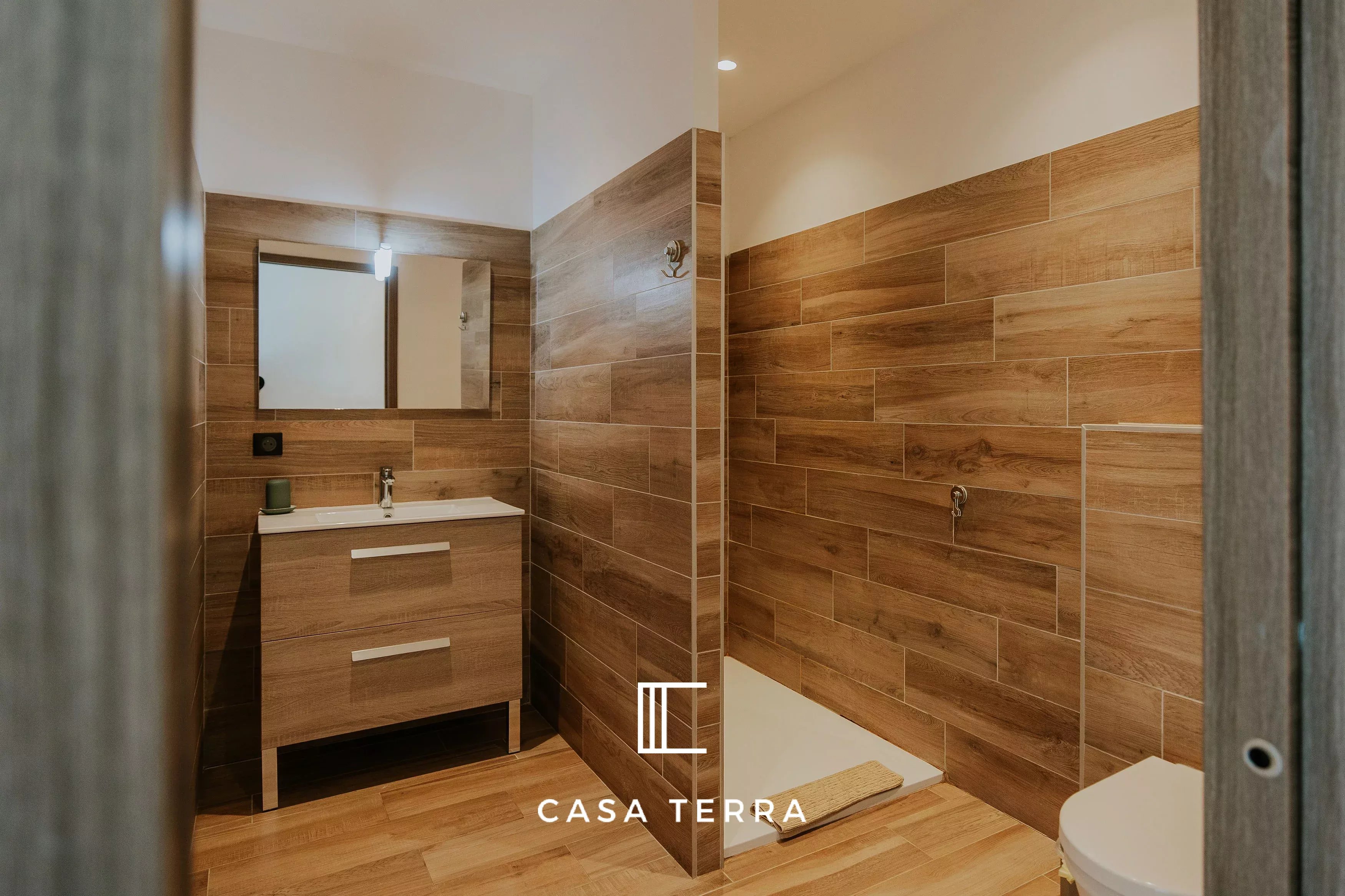 Photo 12 — Casa Terra Real Estate