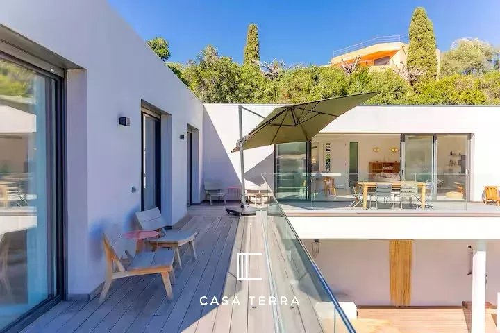 Photo 2 — Casa Terra Real Estate