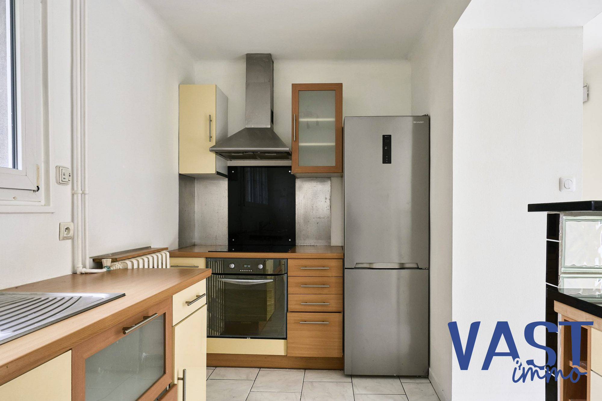 Photo 12 — VASTIMMO