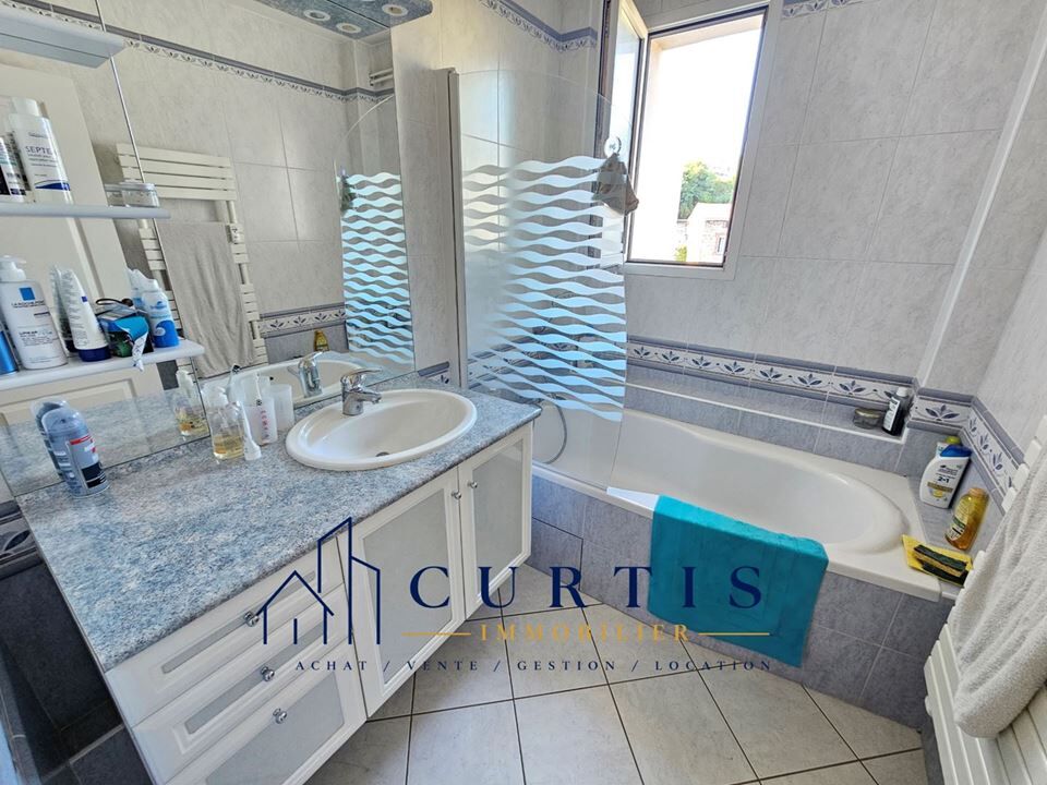 Photo 8 — CURTIS IMMOBILIER