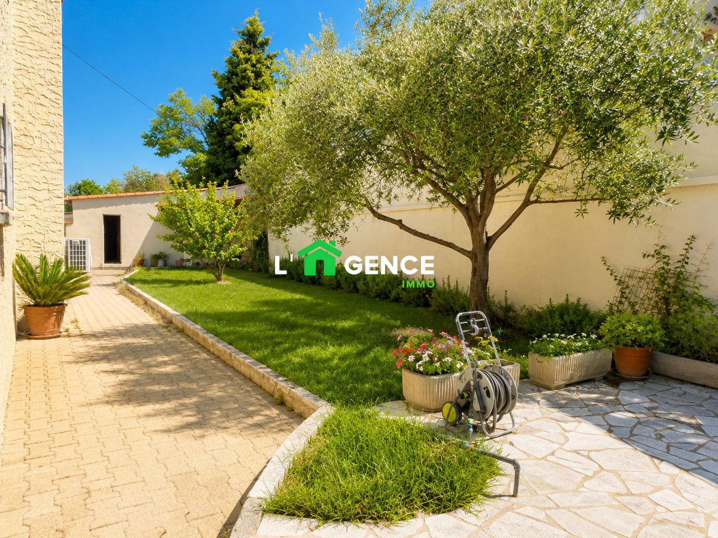 Photo 2 — L'AGENCE Immo