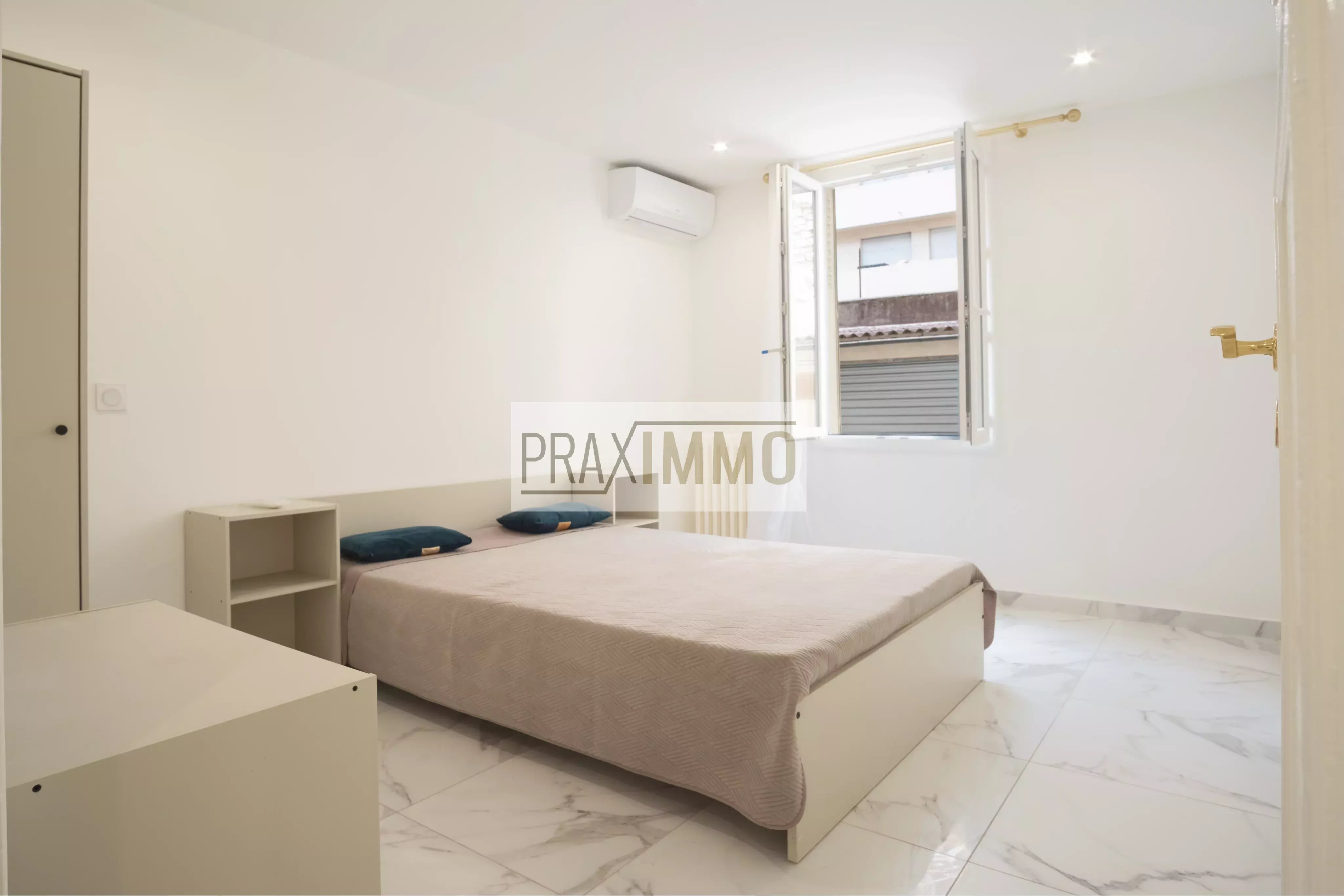Photo 19 — Praximmo