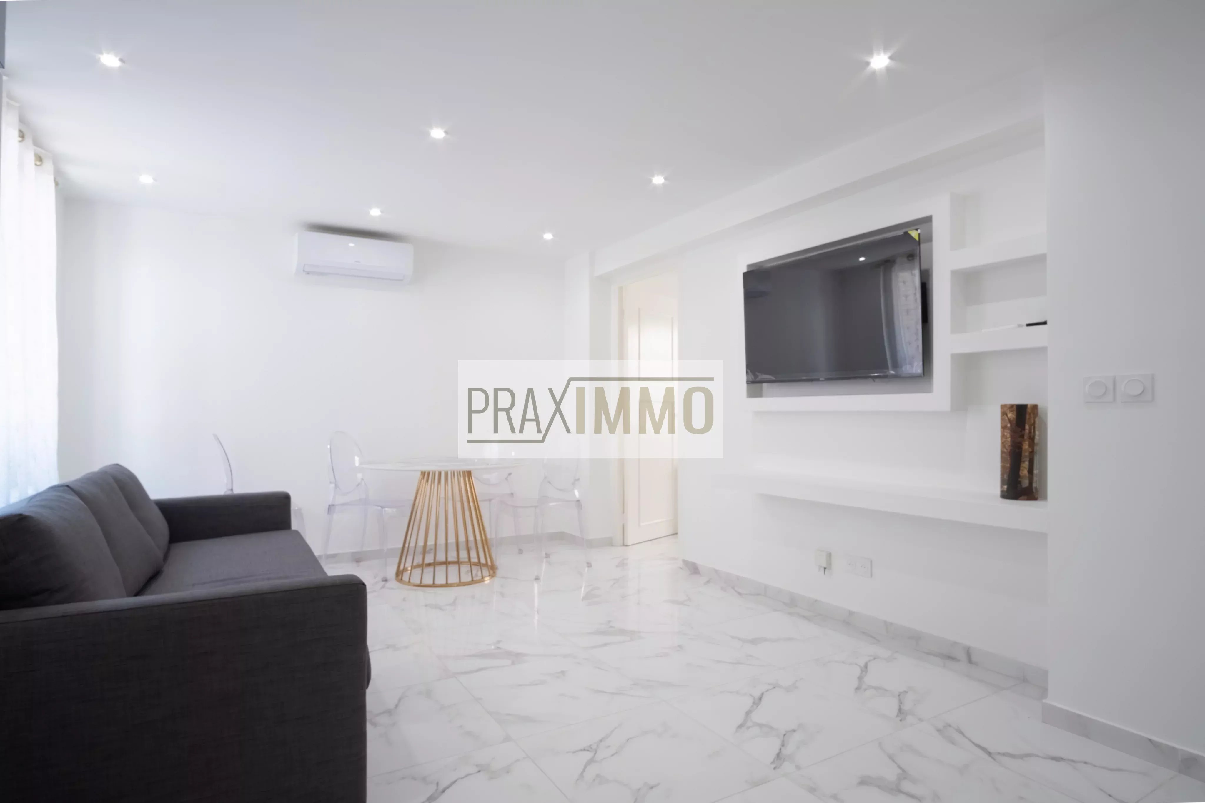 Photo 12 — Praximmo