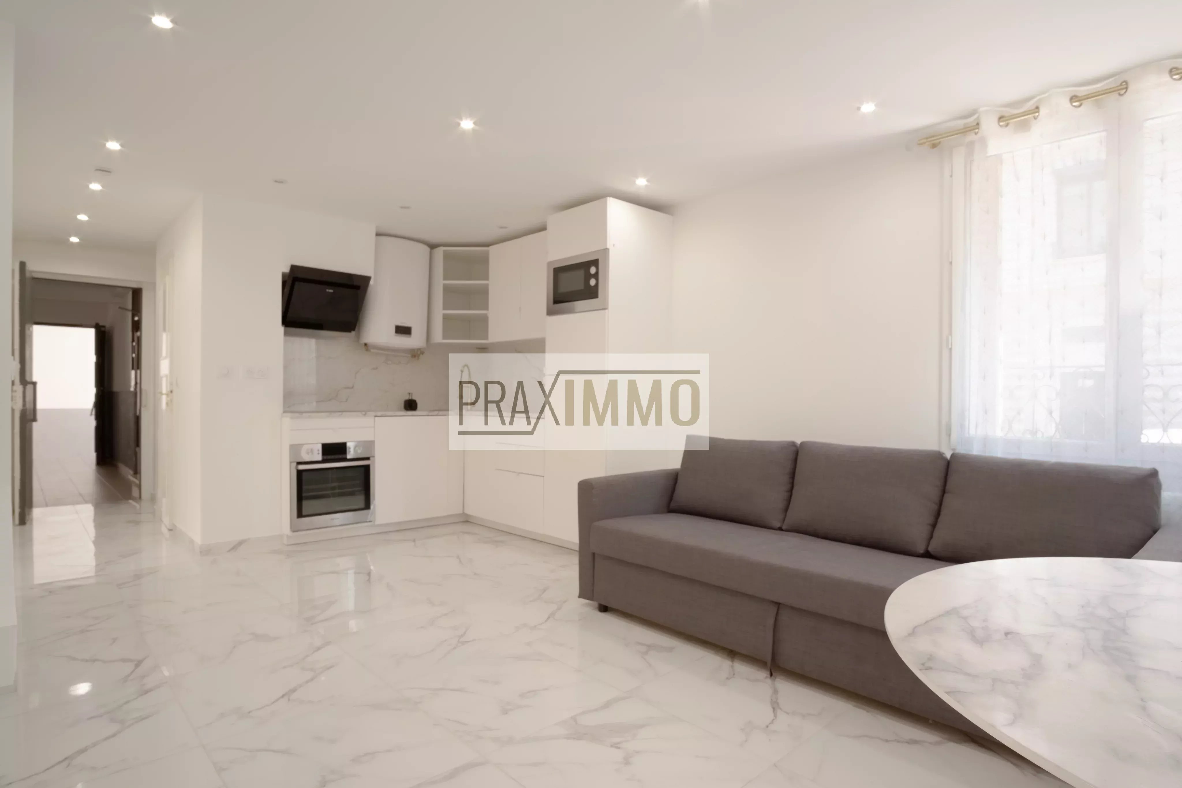 Photo 3 — Praximmo
