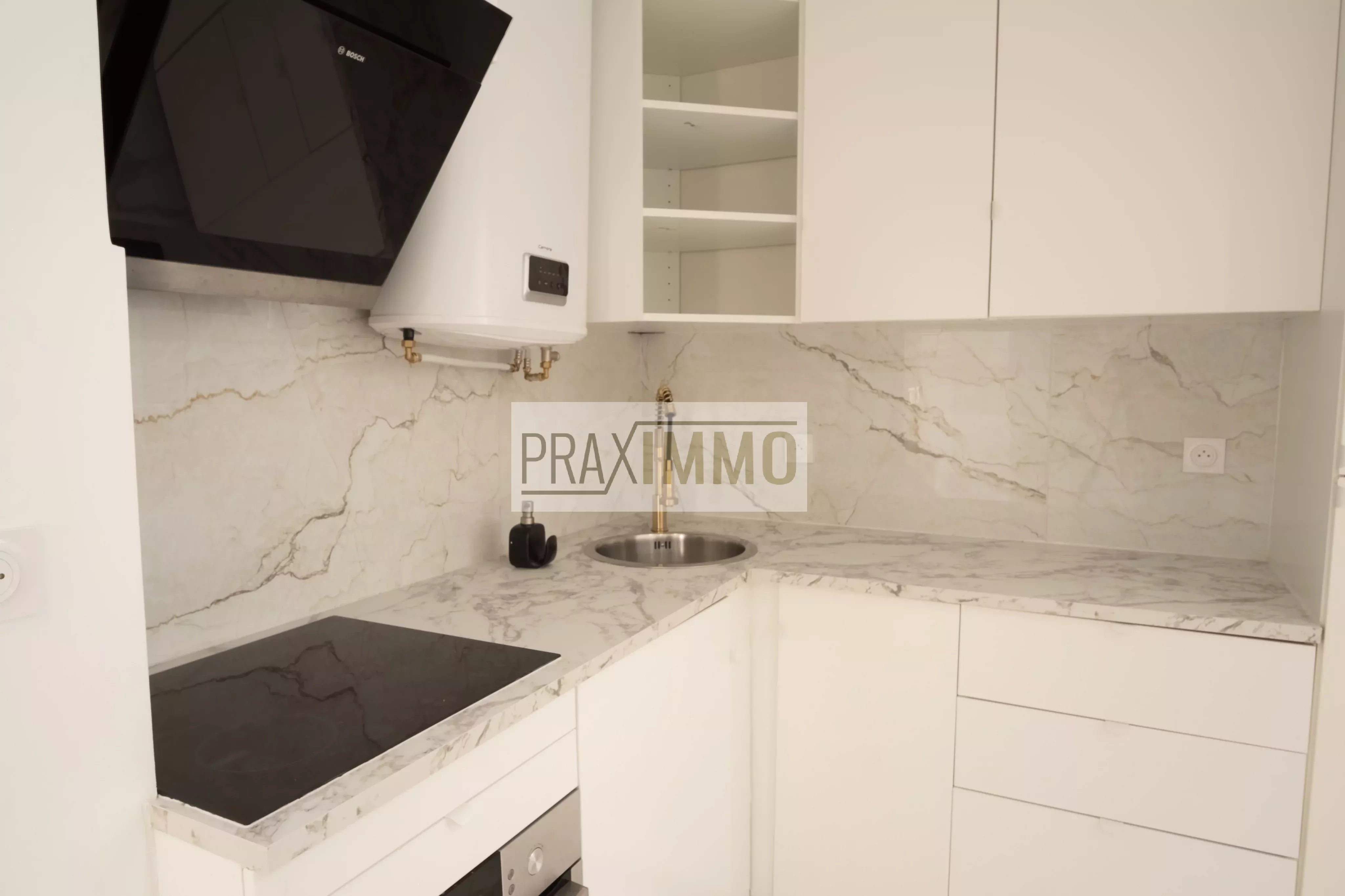Photo 2 — Praximmo