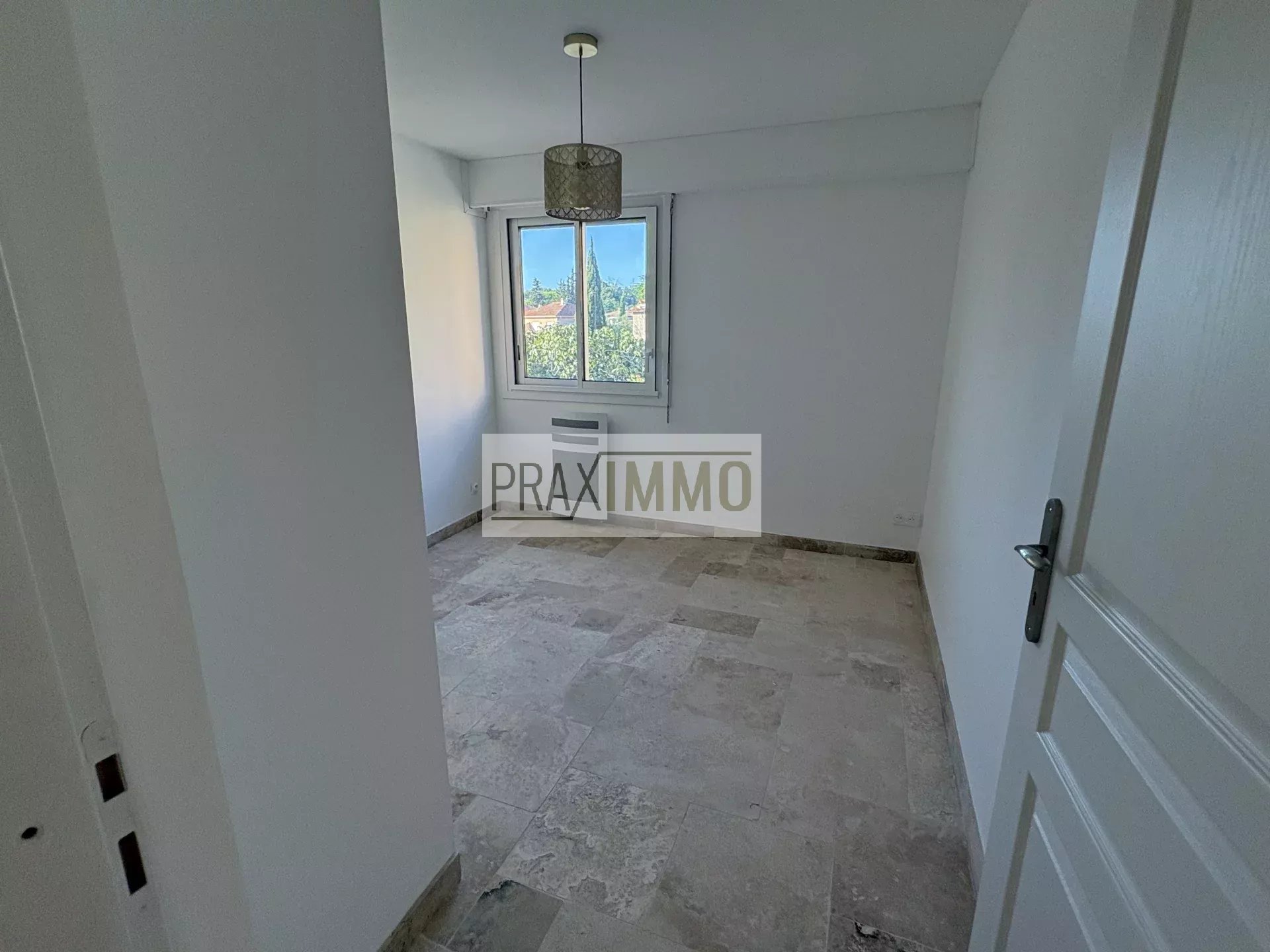 Photo 13 — Praximmo