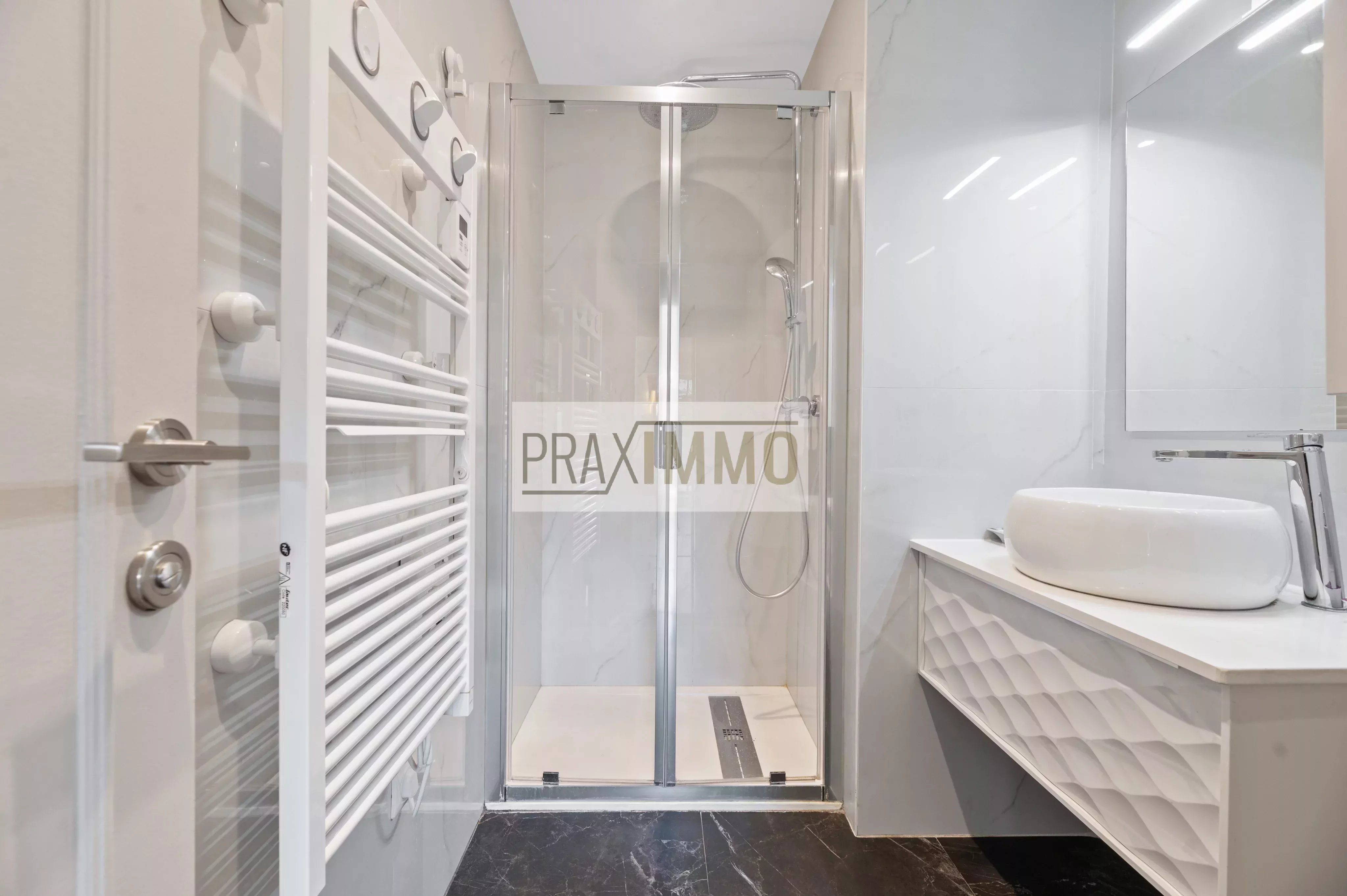 Photo 12 — Praximmo