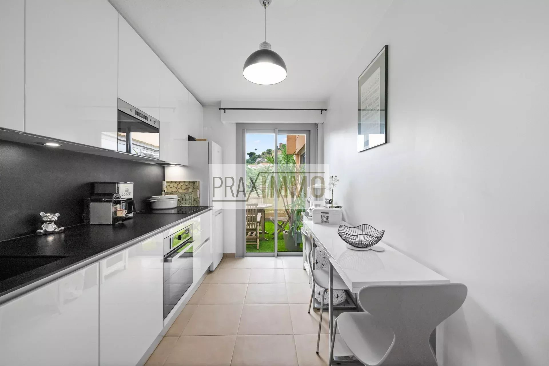 Photo 5 — Praximmo