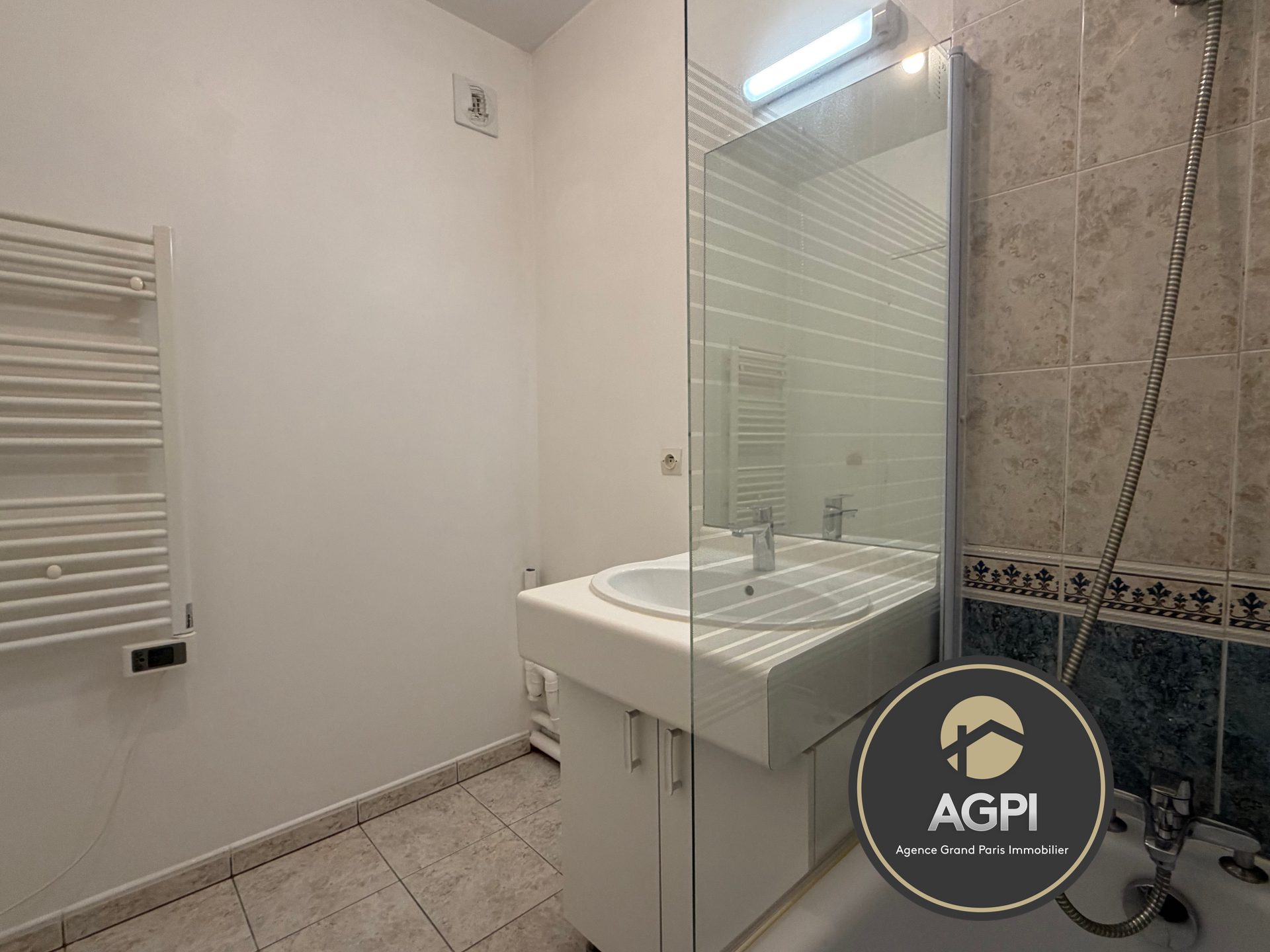 Photo 12 — AGENCE GRAND PARIS IMMOBILIER