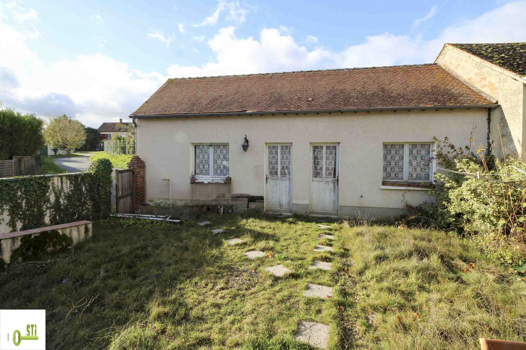 Photo 3 — ST Immobilier