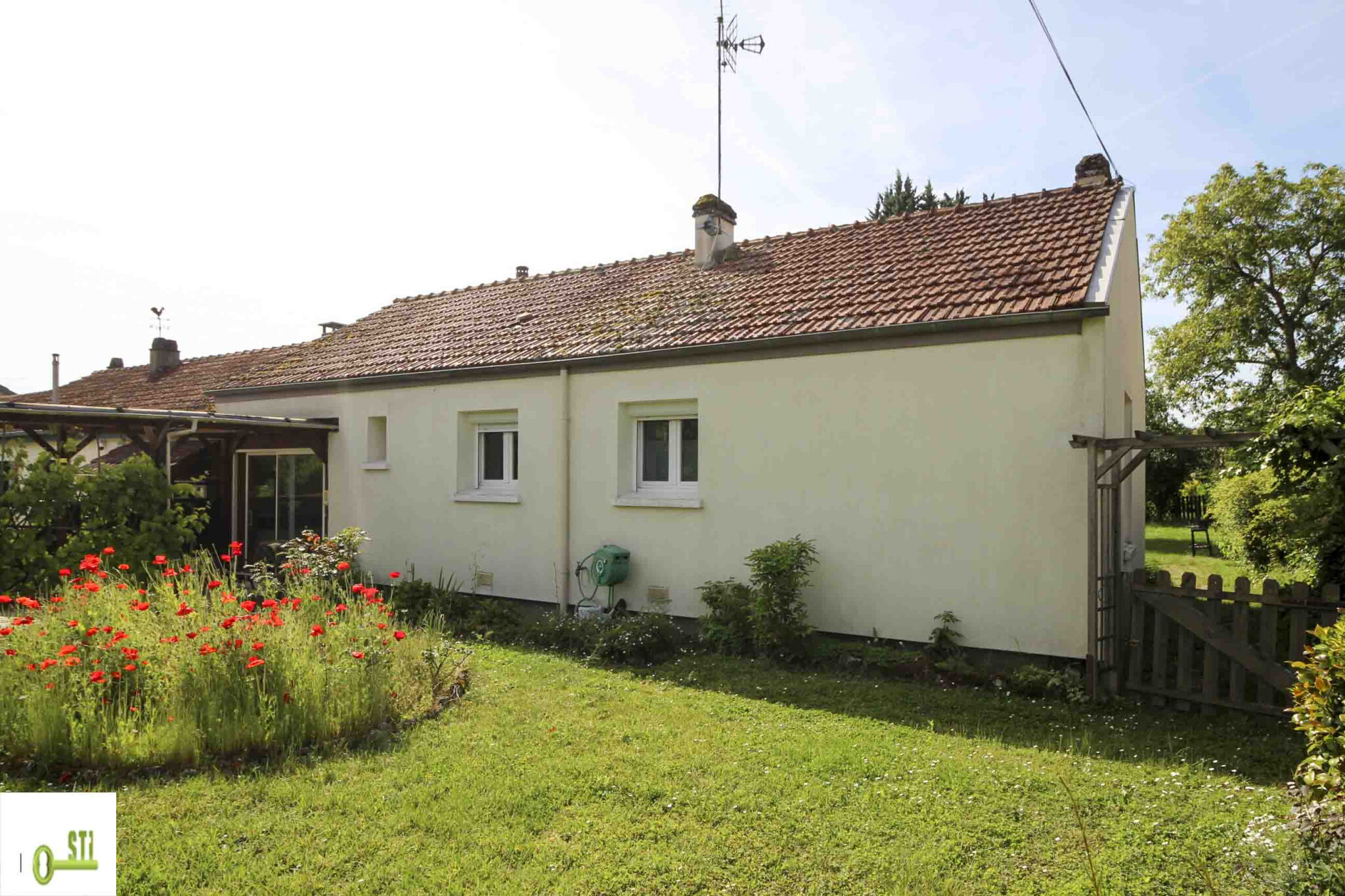 Photo 2 — ST Immobilier
