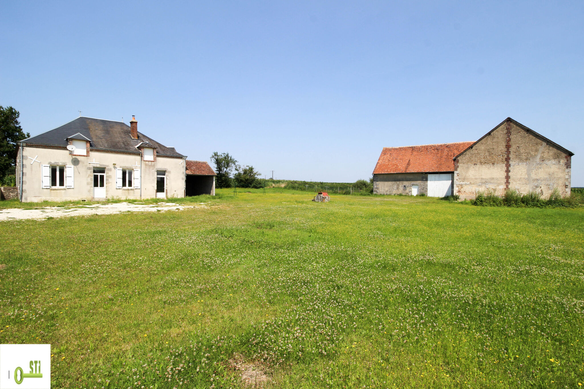 Photo 2 — ST Immobilier