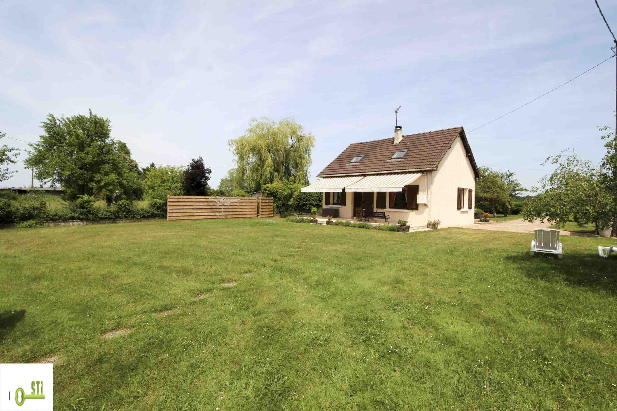 Photo 2 — ST Immobilier