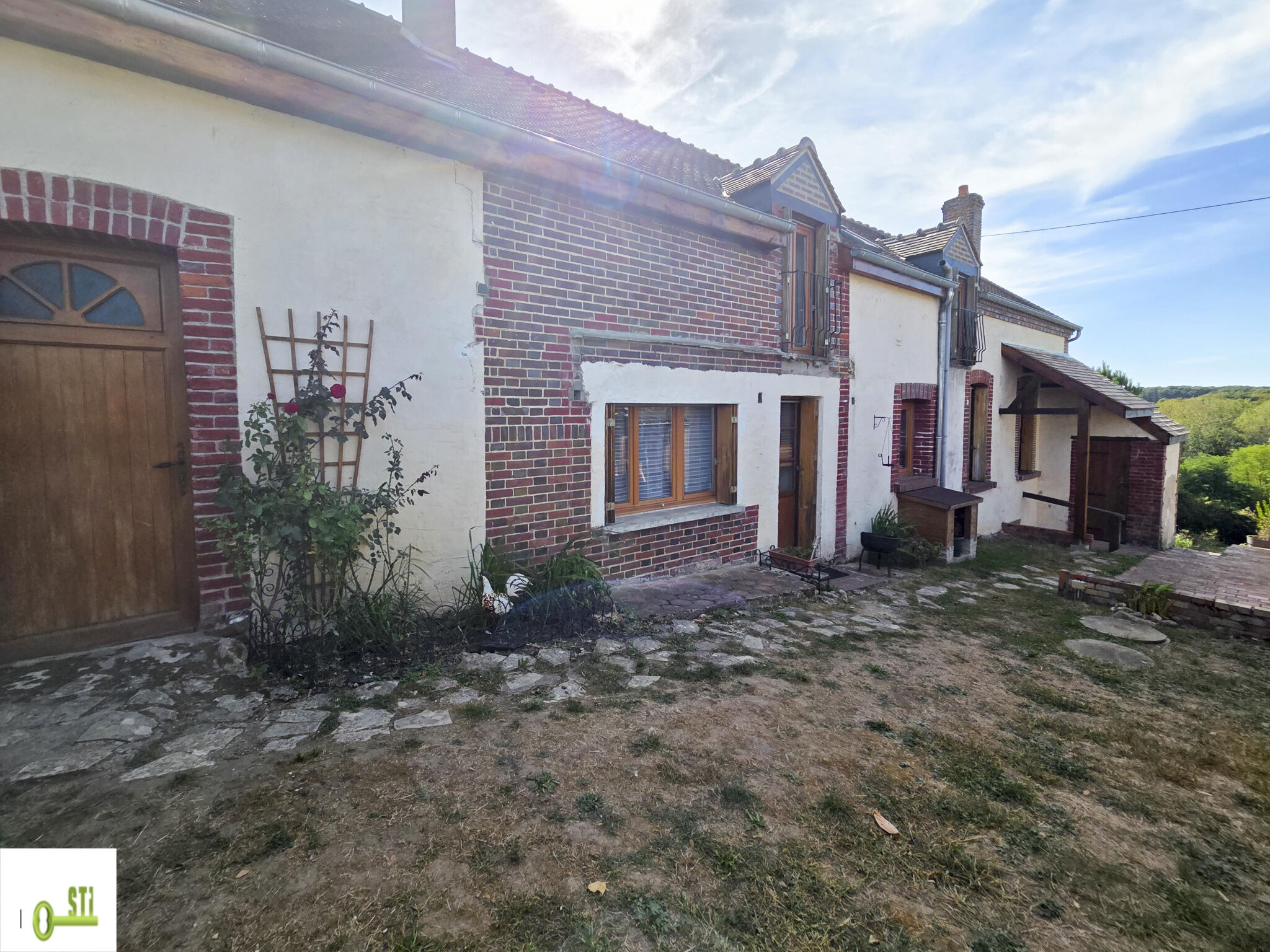 Photo 2 — ST Immobilier