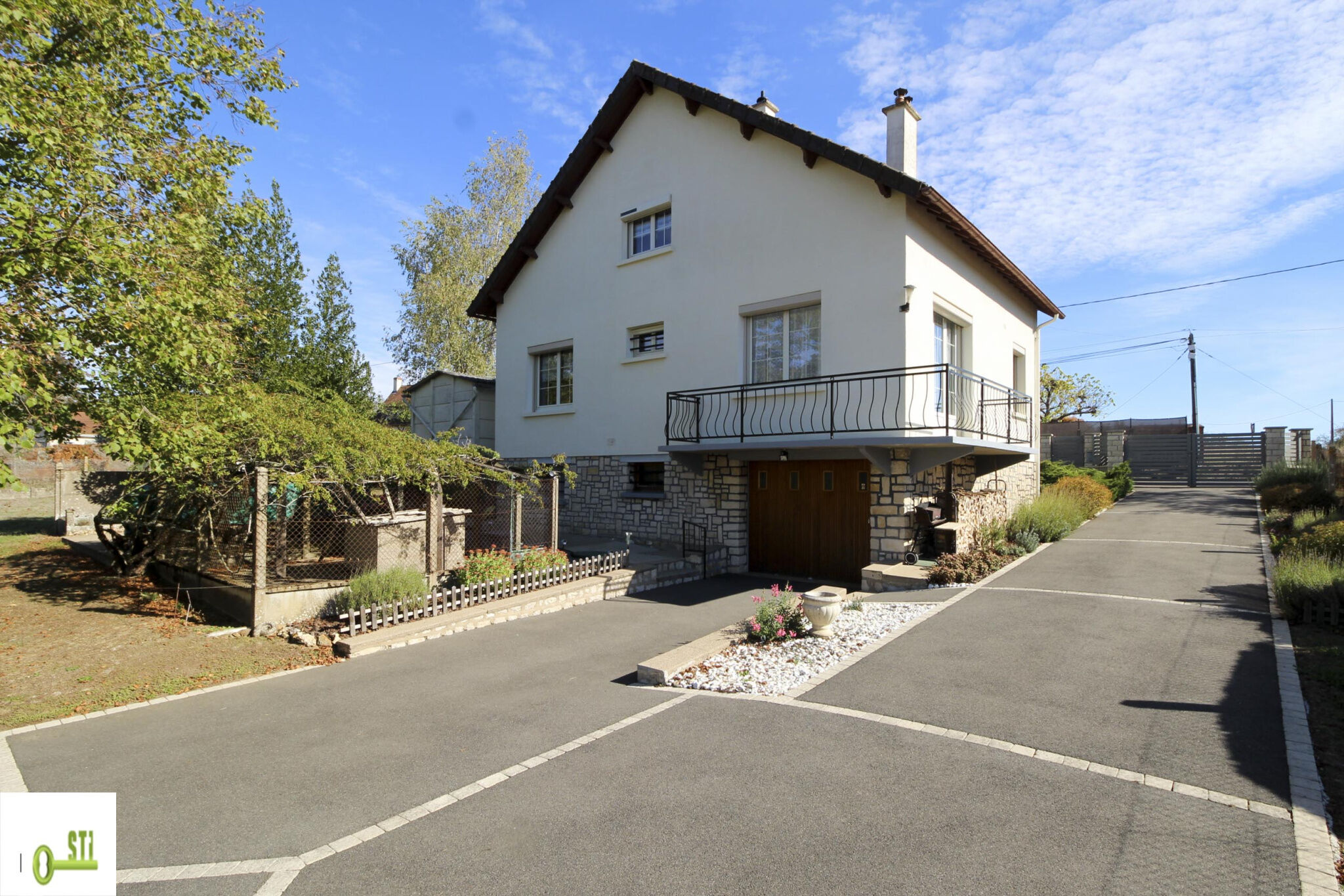 Photo 3 — ST Immobilier