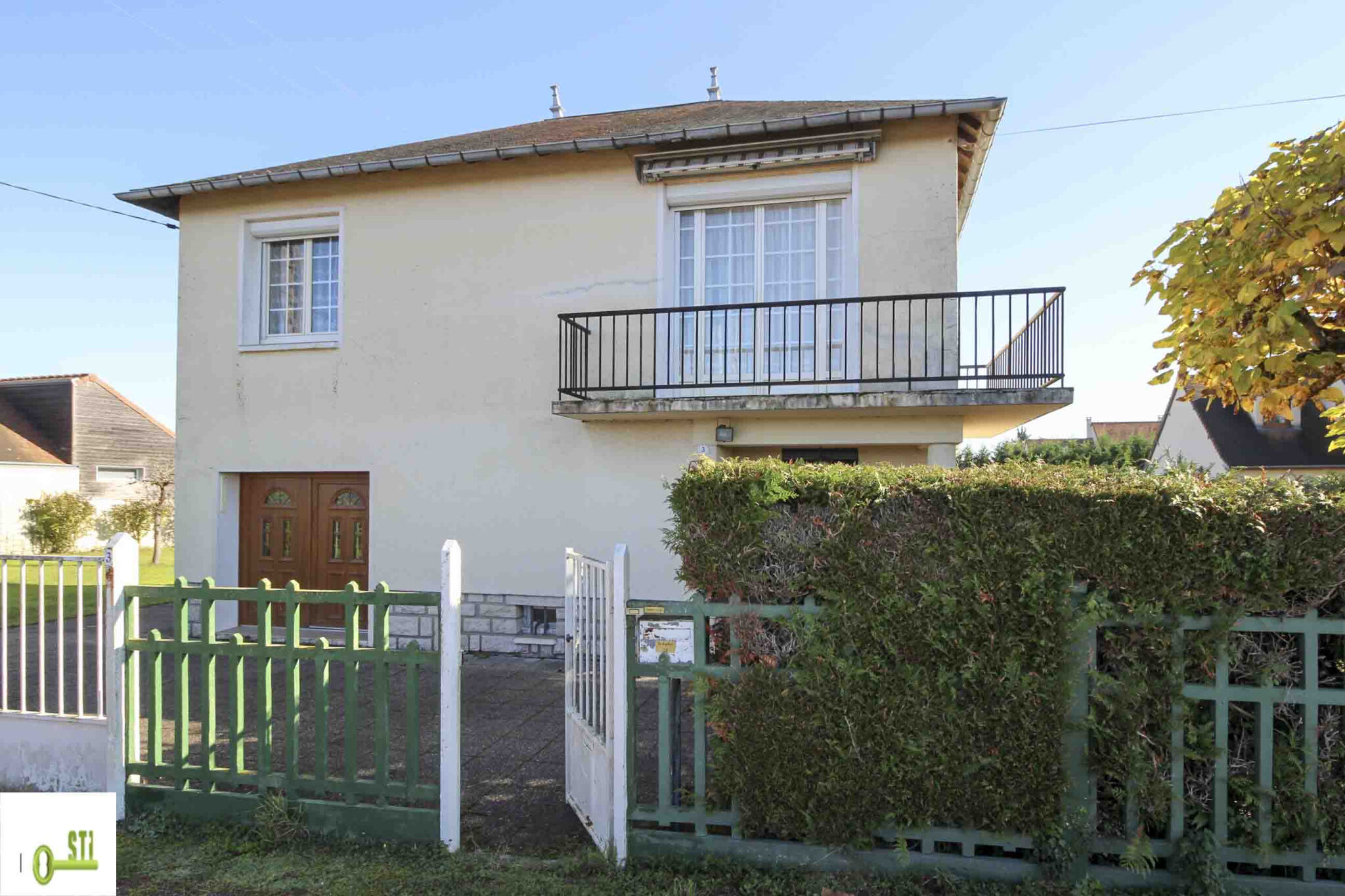 Photo 2 — ST Immobilier
