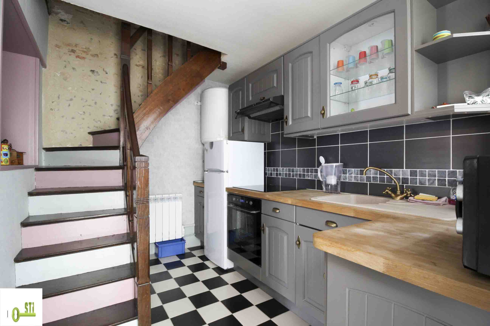 Photo 2 — ST Immobilier