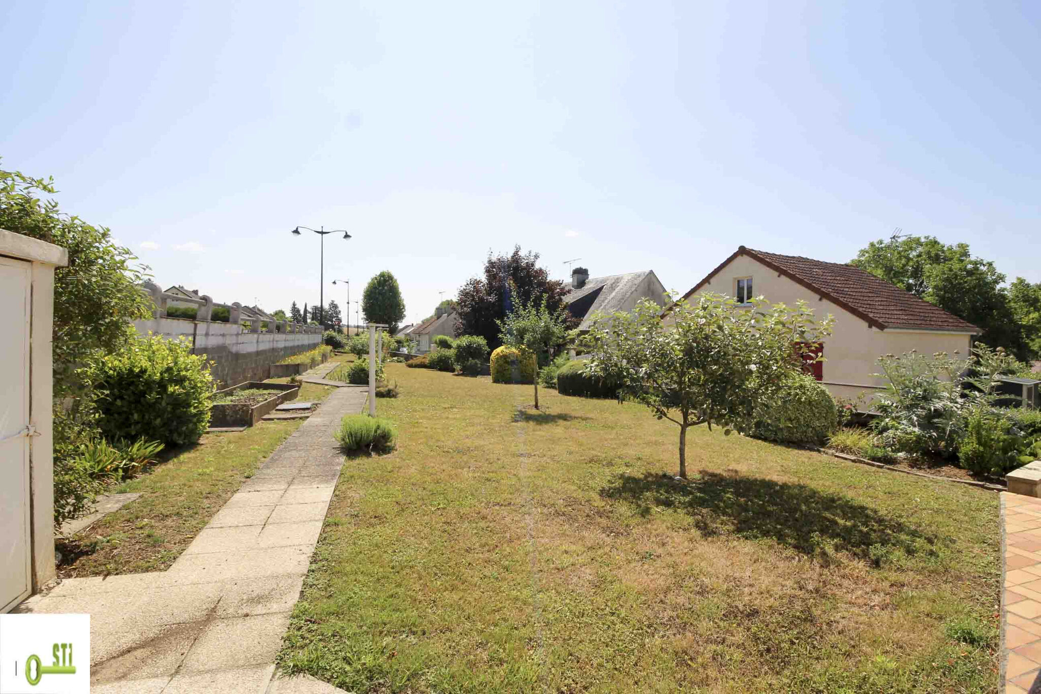 Photo 3 — ST Immobilier