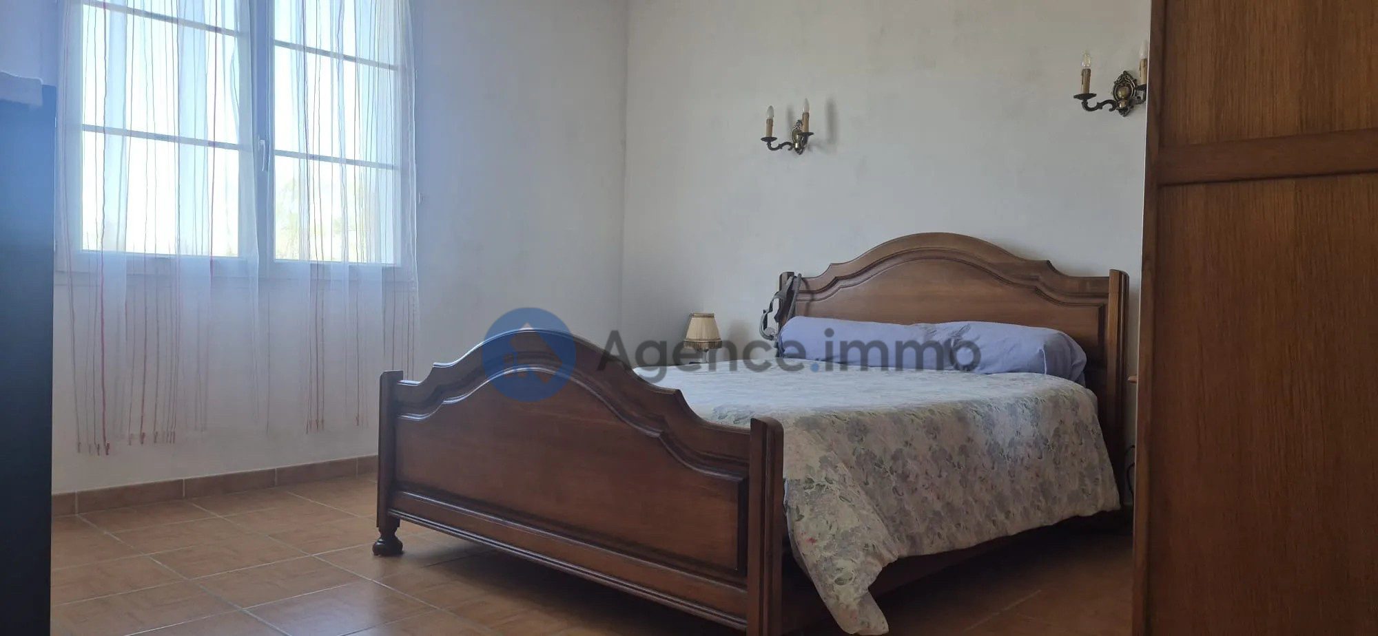 Photo 10 — AGENCIMMO