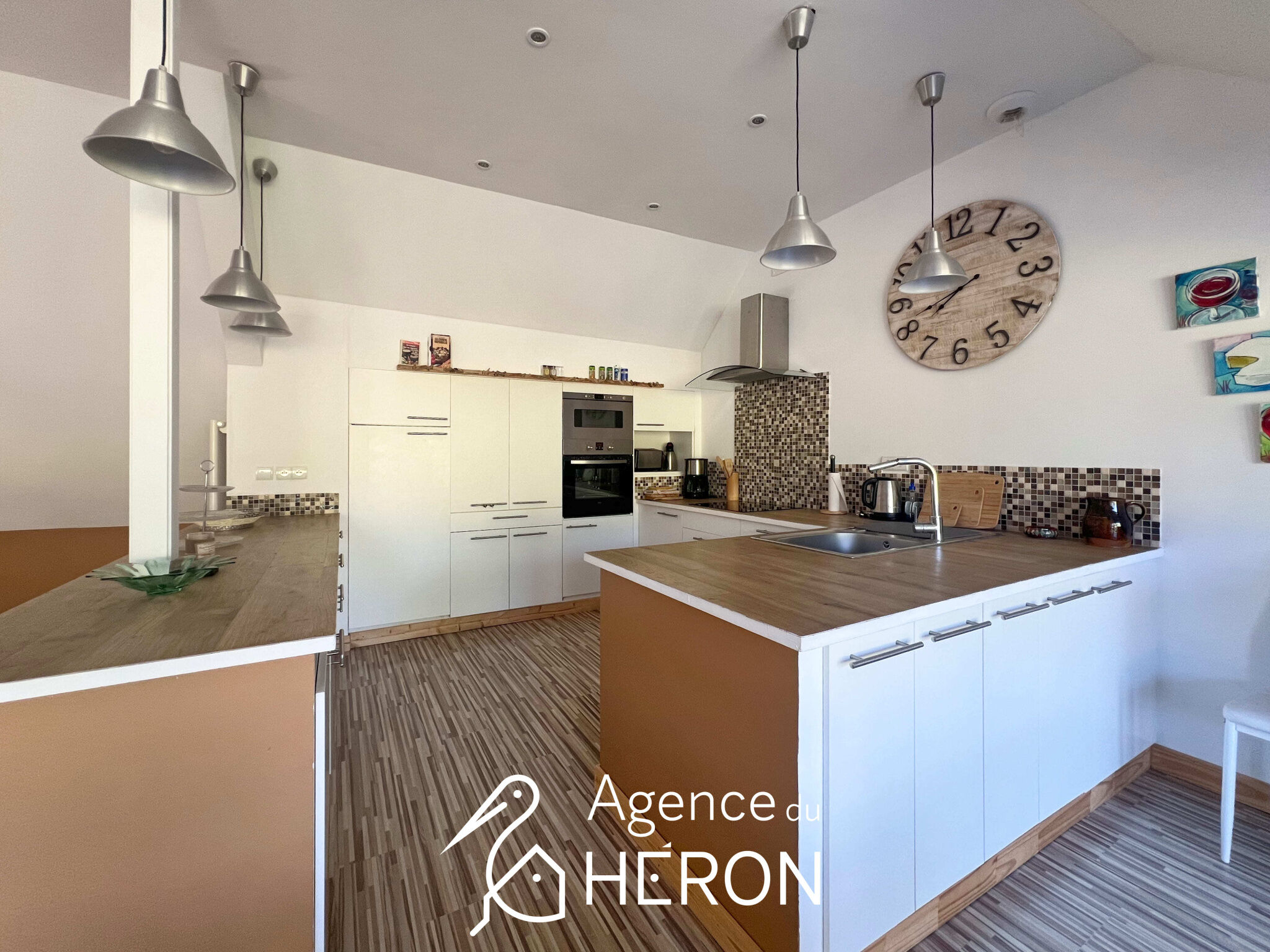 Photo 7 — L'AGENCE DU HERON