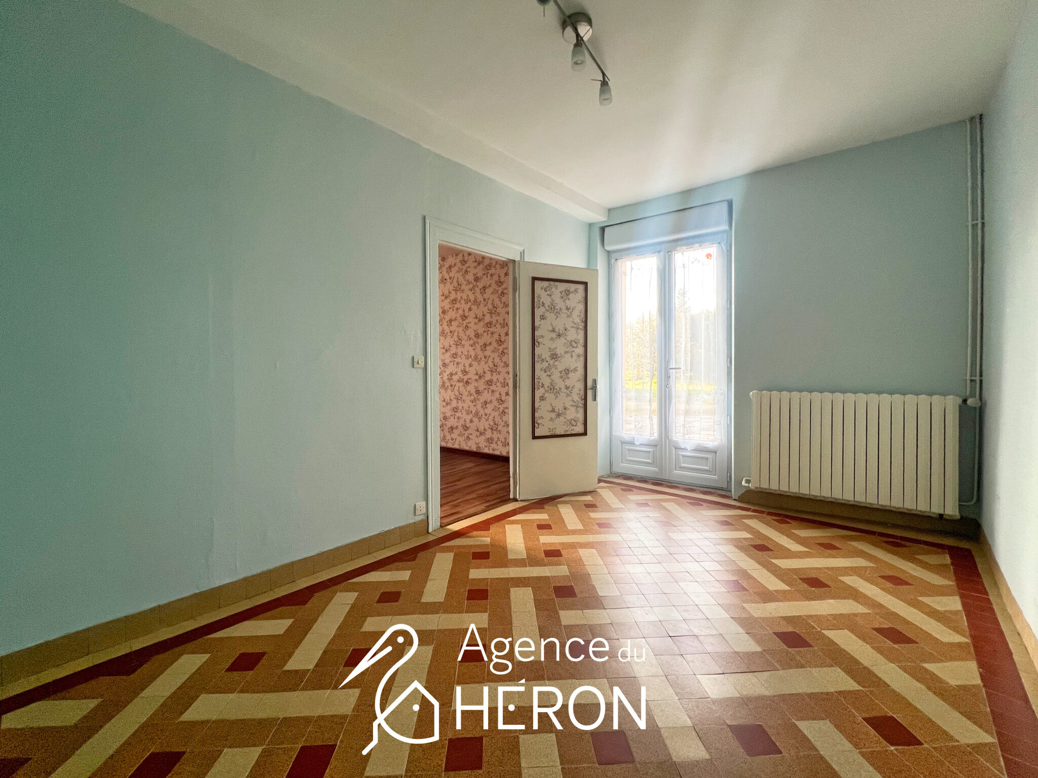 Photo 13 — L'AGENCE DU HERON