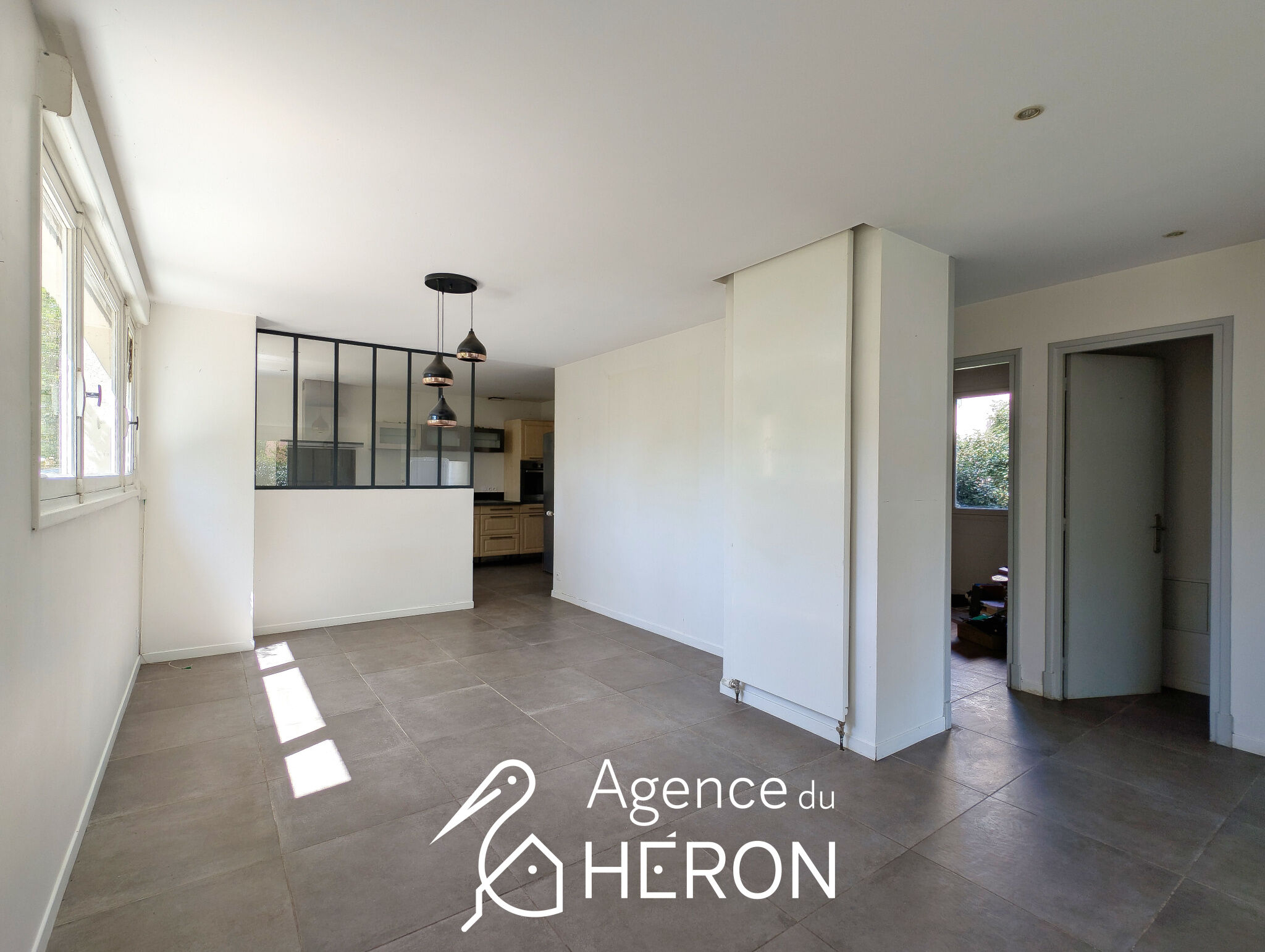 Photo 12 — L'AGENCE DU HERON