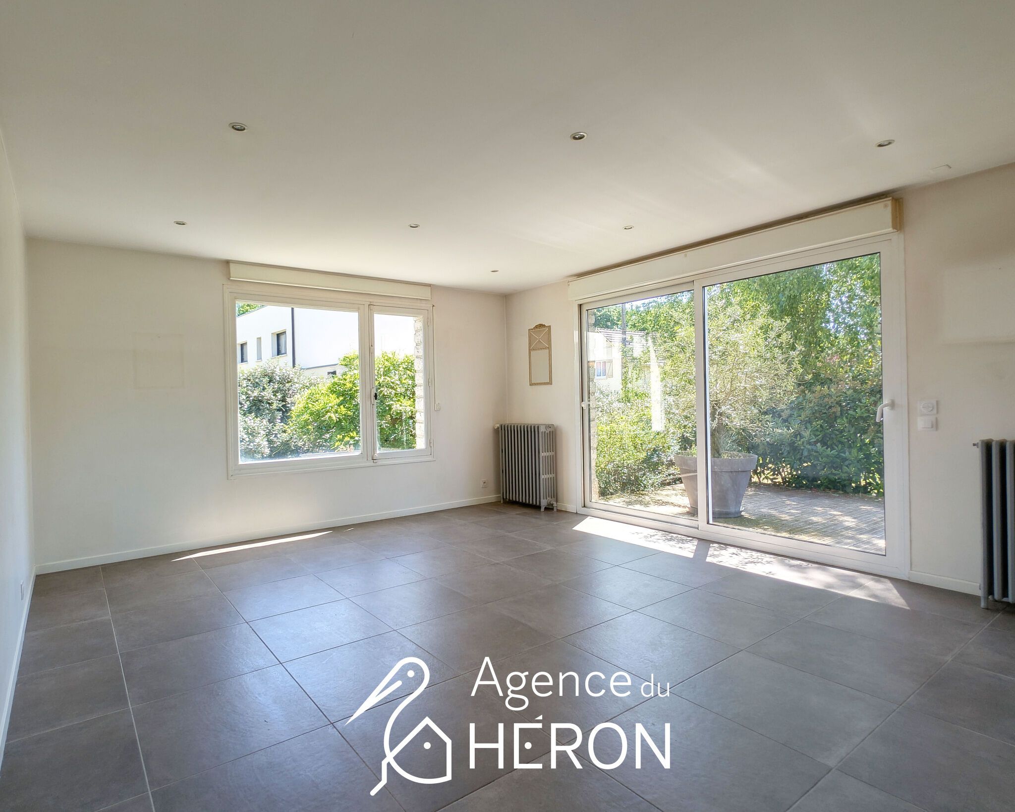 Photo 9 — L'AGENCE DU HERON